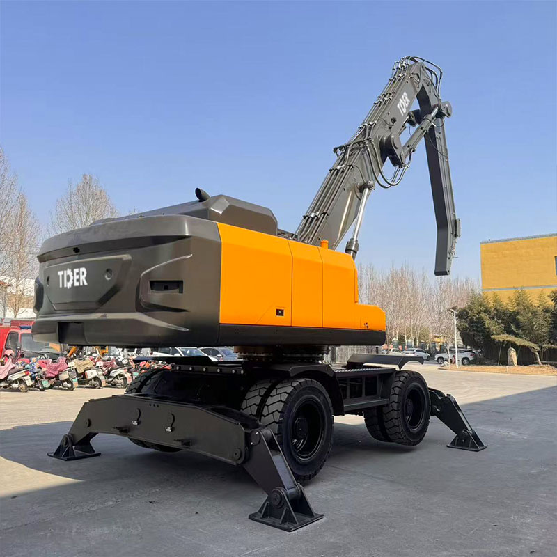 Pelle sur pneus de 40 tonnes avec grappin rotatif à palette orange